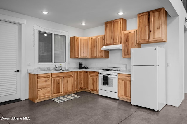 3298 W Coon Creek Rd, Plummer, ID 83851 - kitchen featuring white appliances, under cabinet range hood, a sink, recessed lighting, and concrete flooring