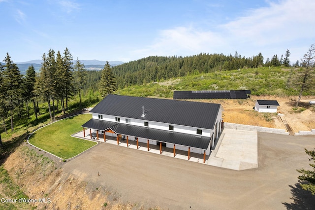 3298 W Coon Creek Rd, Plummer, ID 83851 - view from above of property with a forest and a mountainous background