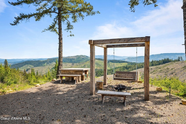 3298 W Coon Creek Rd, Plummer, ID 83851 - view of yard featuring a mountain view and an outdoor fire pit