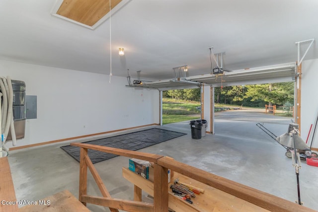 684 Chute Canyon Way, Bonners Ferry, ID 83805 - garage with a garage door opener and baseboards