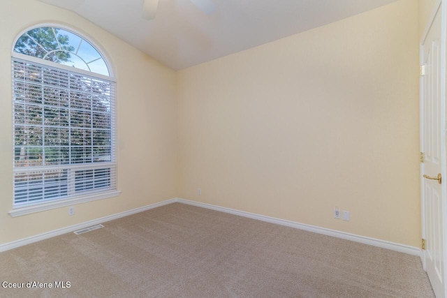 684 Chute Canyon Way, Bonners Ferry, ID 83805 - carpeted empty room featuring lofted ceiling, ceiling fan, and baseboards