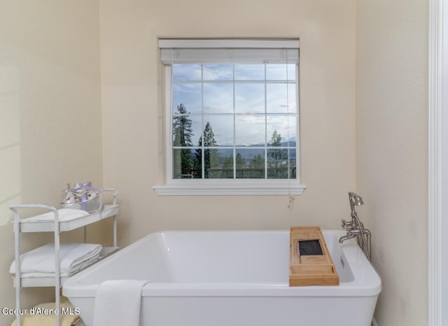 684 Chute Canyon Way, Bonners Ferry, ID 83805 - full bath featuring healthy amount of natural light and a freestanding tub