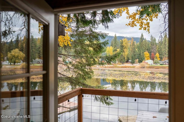 7547 W Channel Ln, Rathdrum, ID 83858 - water view featuring a heavily wooded area