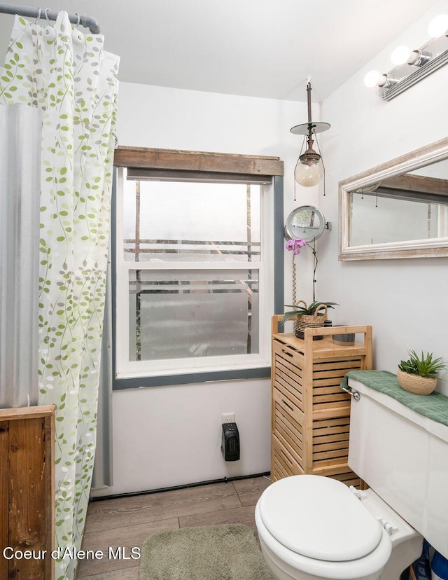 7547 W Channel Ln, Rathdrum, ID 83858 - bathroom with toilet and wood finished floors