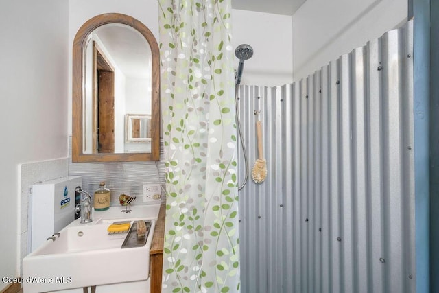 7547 W Channel Ln, Rathdrum, ID 83858 - bathroom with decorative backsplash and a sink