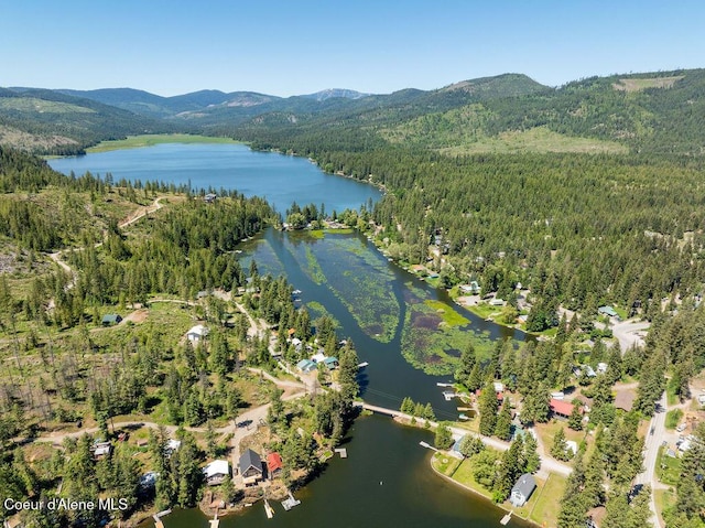 7547 W Channel Ln, Rathdrum, ID 83858 - aerial view of property's location featuring a forest and a water and mountain view