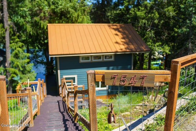 7547 W Channel Ln, Rathdrum, ID 83858 - view of front facade featuring metal roof and a standing seam roof