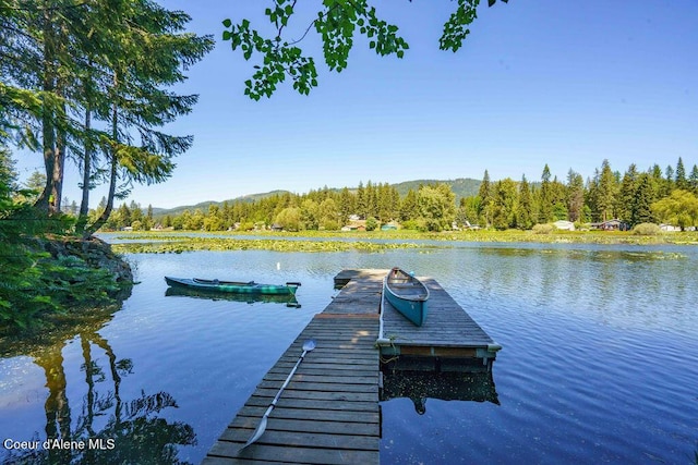 7547 W Channel Ln, Rathdrum, ID 83858 - dock area with a water view and a wooded view