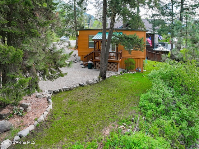 16646 E Cape Horn Rd, Bayview, ID 83803 - back of house with a wooden deck and a yard