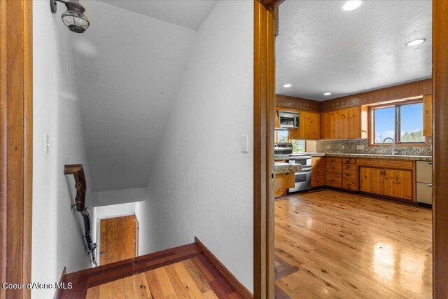 5239 E Dodd Rd, Hayden, ID 83835 - stairs featuring wood finished floors and recessed lighting