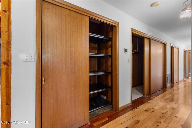 5239 E Dodd Rd, Hayden, ID 83835 - corridor with light wood-style floors
