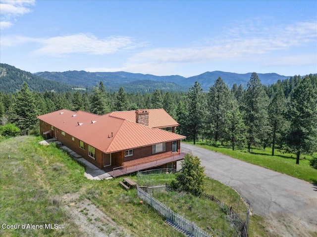 5239 E Dodd Rd, Hayden, ID 83835 - view of subject property with a heavily wooded area and a mountainous background