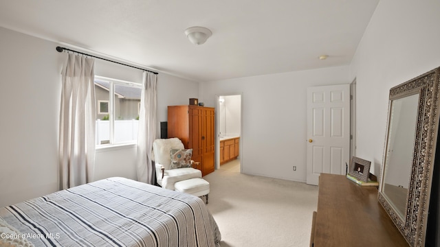 bedroom featuring light carpet