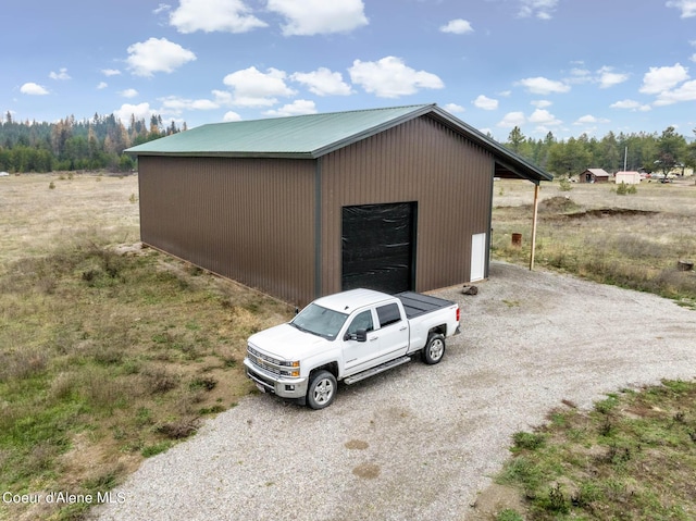 view of outbuilding with an outbuilding
