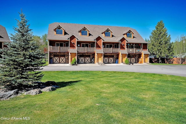 1 Elsie Peak Ct Unit B1 Bldg B, Pinehurst, ID 83850 - view of front of house featuring a garage, asphalt driveway, and a front yard