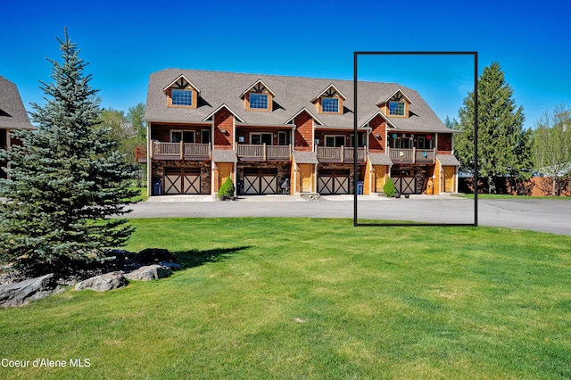 1 Elsie Peak Ct Unit B1 Bldg B, Pinehurst, ID 83850 - view of front facade with a garage, driveway, and a front yard