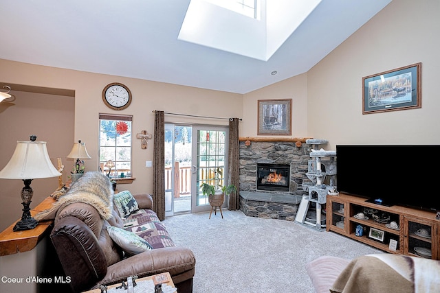 1 Elsie Peak Ct Unit B1 Bldg B, Pinehurst, ID 83850 - living area with carpet, a stone fireplace, a skylight, and lofted ceiling