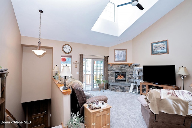 1 Elsie Peak Ct Unit B1 Bldg B, Pinehurst, ID 83850 - living room with carpet floors, a ceiling fan, lofted ceiling, a skylight, and a fireplace