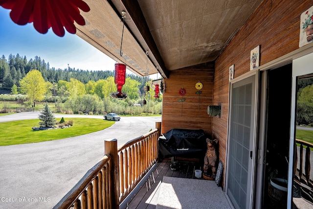1 Elsie Peak Ct Unit B1 Bldg B, Pinehurst, ID 83850 - balcony featuring covered porch and a forest view