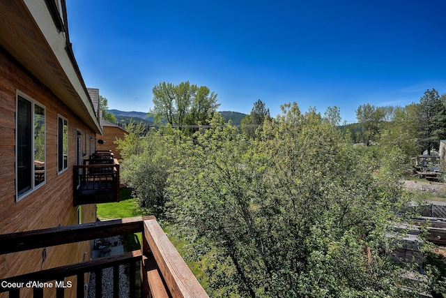 1 Elsie Peak Ct Unit B1 Bldg B, Pinehurst, ID 83850 - view of yard featuring a deck with mountain view