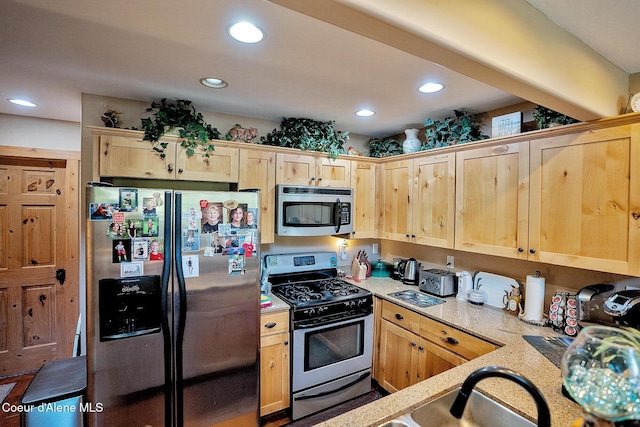1 Elsie Peak Ct Unit B1 Bldg B, Pinehurst, ID 83850 - kitchen with stainless steel appliances, light brown cabinetry, recessed lighting, light stone countertops, and a sink