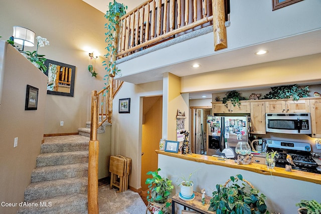 1 Elsie Peak Ct Unit B1 Bldg B, Pinehurst, ID 83850 - stairs featuring recessed lighting, baseboards, and a high ceiling