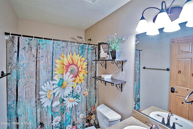 1 Elsie Peak Ct Unit B1 Bldg B, Pinehurst, ID 83850 - full bath with toilet, curtained shower, and vanity