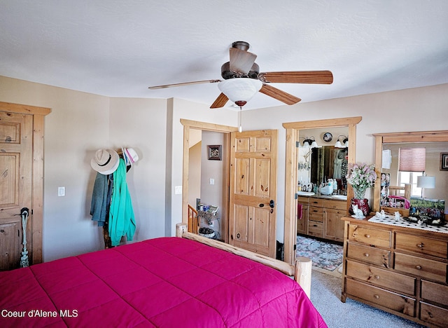 1 Elsie Peak Ct Unit B1 Bldg B, Pinehurst, ID 83850 - carpeted bedroom featuring connected bathroom and ceiling fan