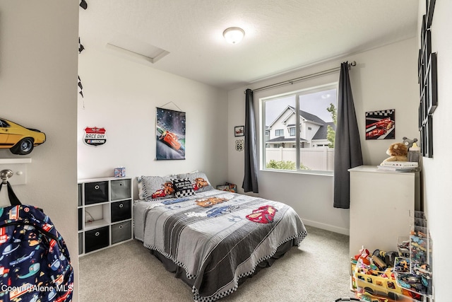 1769 N Chetco Dr, Post Falls, ID 83854 - carpeted bedroom featuring attic access and baseboards