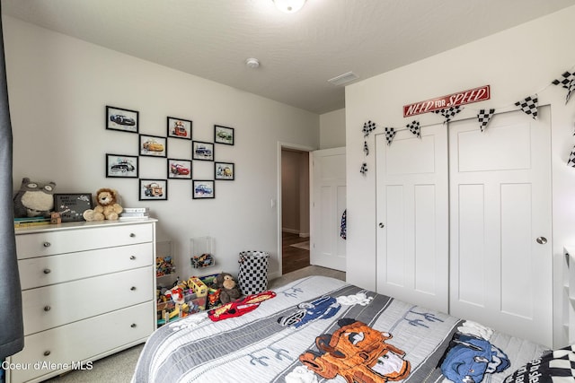 1769 N Chetco Dr, Post Falls, ID 83854 - carpeted bedroom featuring a closet