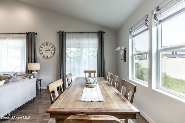 1769 N Chetco Dr, Post Falls, ID 83854 - dining space with vaulted ceiling, dark wood-type flooring, and baseboards