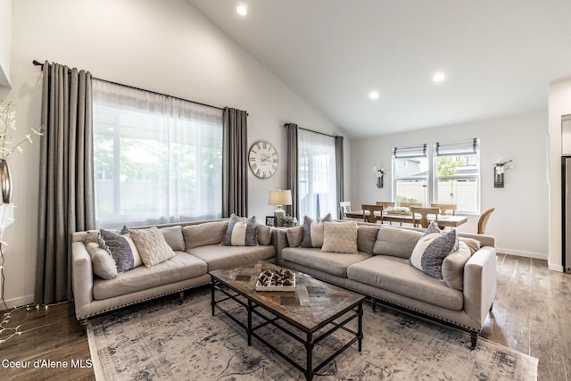 1769 N Chetco Dr, Post Falls, ID 83854 - living area featuring recessed lighting, wood finished floors, baseboards, and high vaulted ceiling