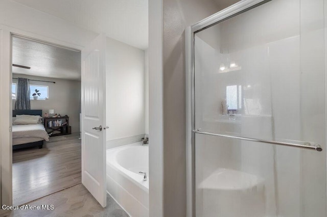 3316 N Van Winkle St, Post Falls, ID 83854 - ensuite bathroom with a stall shower and a bath