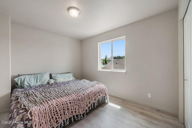 3316 N Van Winkle St, Post Falls, ID 83854 - bedroom with wood finished floors and baseboards
