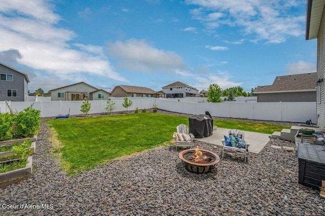 3316 N Van Winkle St, Post Falls, ID 83854 - view of yard with an outdoor fire pit, a patio area, and a residential view