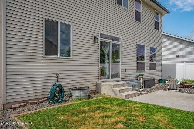3316 N Van Winkle St, Post Falls, ID 83854 - back of house featuring a patio