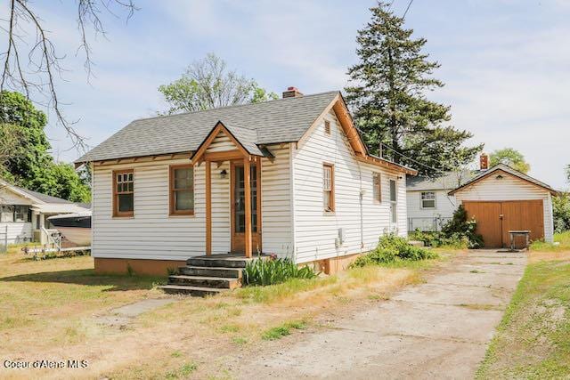 2224 N Park Rd, Spokane Valley, WA 99212 - bungalow featuring driveway, roof with shingles, and a chimney