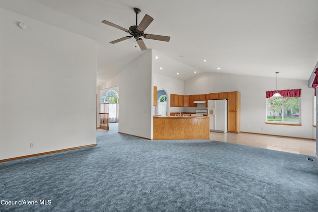 unfurnished living room featuring light colored carpet, recessed lighting, high vaulted ceiling, a ceiling fan, and baseboards