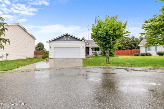 1135 W Wishkah Ave, Post Falls, ID 83854 - view of front of property with concrete driveway and a garage