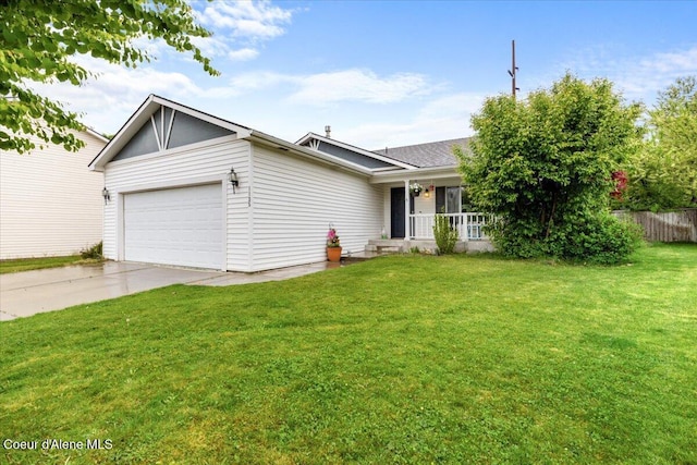 1135 W Wishkah Ave, Post Falls, ID 83854 - ranch-style house with an attached garage and concrete driveway