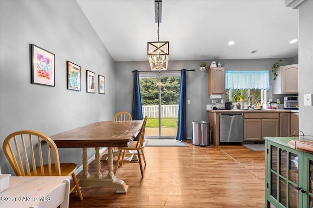 1135 W Wishkah Ave, Post Falls, ID 83854 - dining area with light wood-style flooring, recessed lighting, and a chandelier