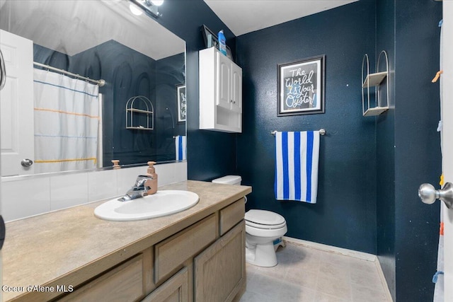 1135 W Wishkah Ave, Post Falls, ID 83854 - bathroom featuring vanity, toilet, baseboards, and a shower with shower curtain