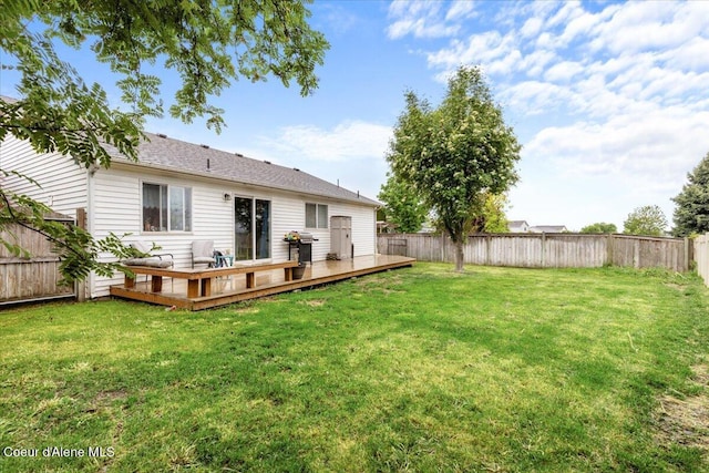 1135 W Wishkah Ave, Post Falls, ID 83854 - back of house featuring a wooden deck
