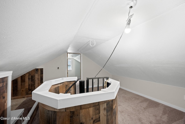 376 Second St, Mullan, ID 83846 - stairs featuring carpet flooring, vaulted ceiling, and baseboards
