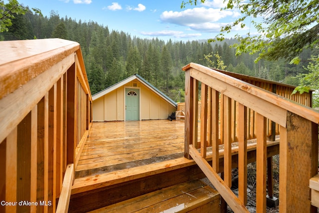 376 Second St, Mullan, ID 83846 - wooden deck with a forest view and an outdoor structure