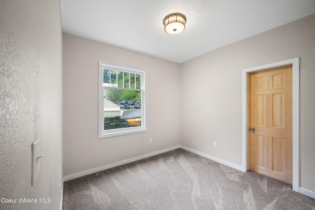 376 Second St, Mullan, ID 83846 - carpeted spare room featuring baseboards