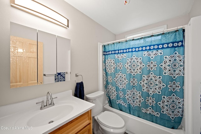 376 Second St, Mullan, ID 83846 - bathroom featuring vanity, toilet, and shower / tub combo with curtain