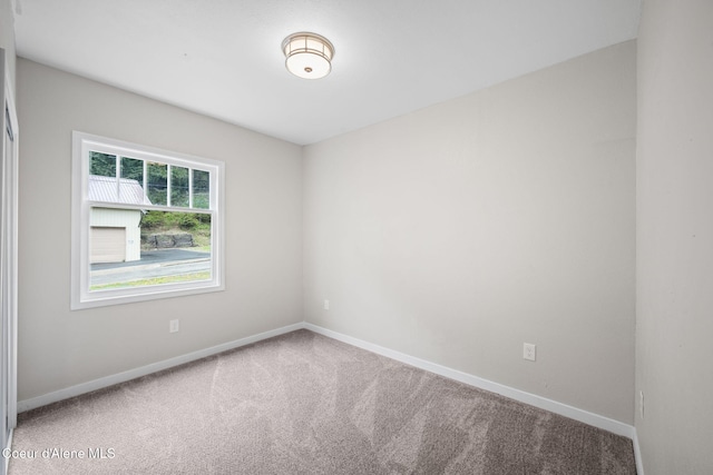 376 Second St, Mullan, ID 83846 - carpeted empty room featuring baseboards