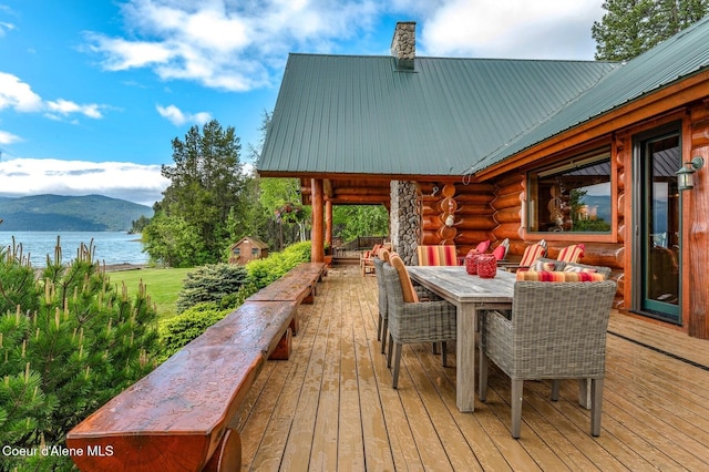 271 W Shore Ln, Sandpoint, ID 83864 - deck with a water and mountain view and outdoor dining area