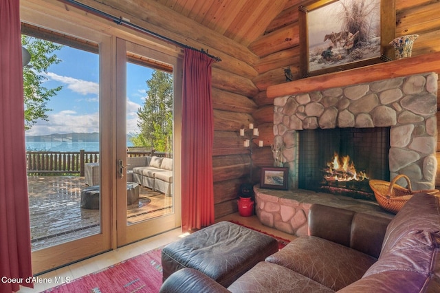 271 W Shore Ln, Sandpoint, ID 83864 - living area featuring rustic walls, healthy amount of natural light, vaulted ceiling, wood ceiling, and french doors